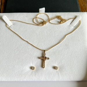 Gift boxes Cross necklace with faux diamond accents & diamond stud earrings.